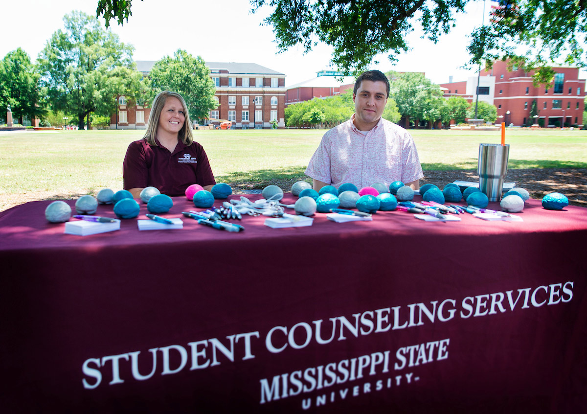 Members of the Student Counseling Service tabling on the drill field