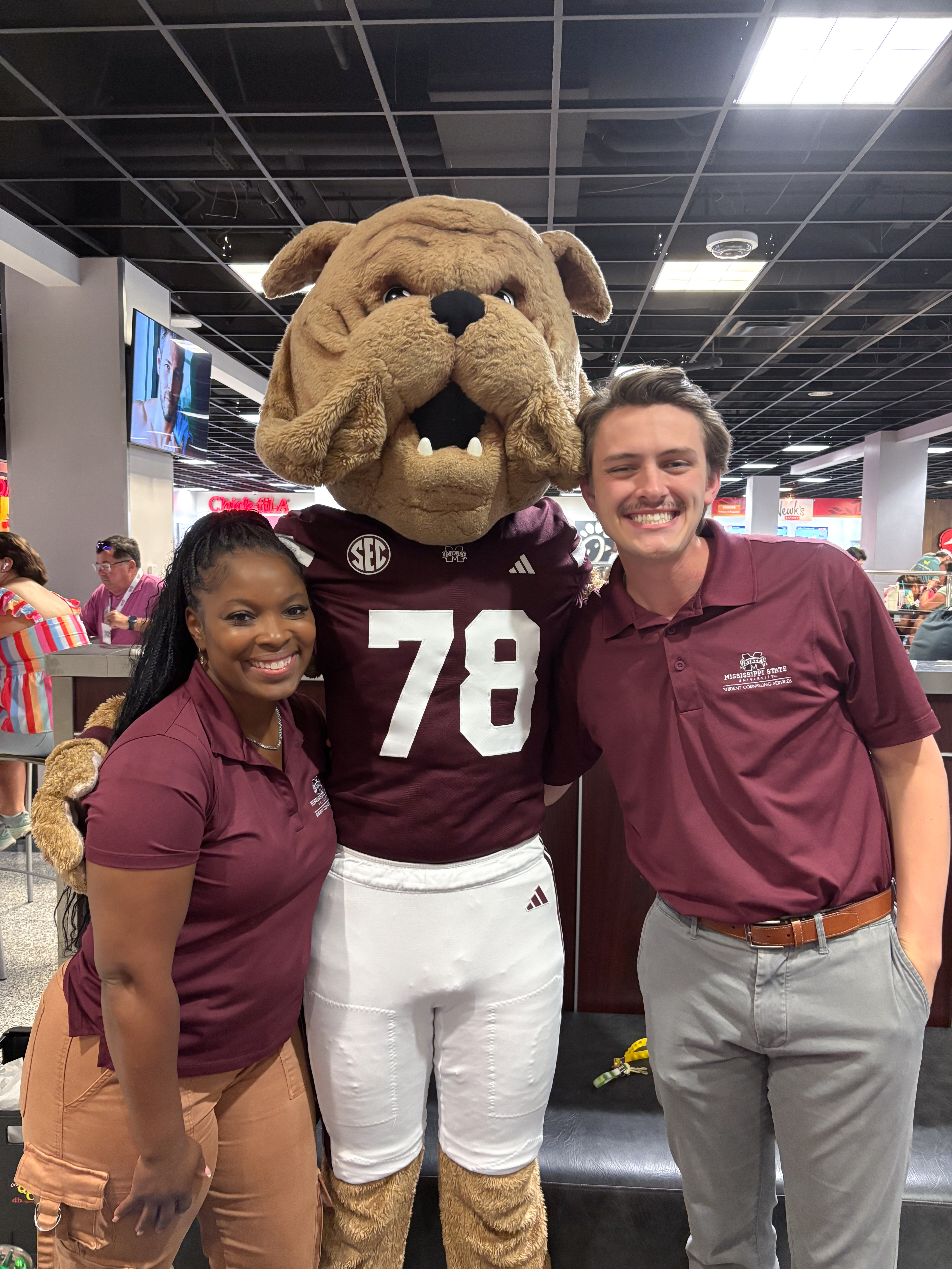 Photo of Matt Freeman and a colleague with Bully in the Union